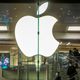 Customers wearing protective facemasks visit an Apple store in Hong Kong on February 22, 2020.